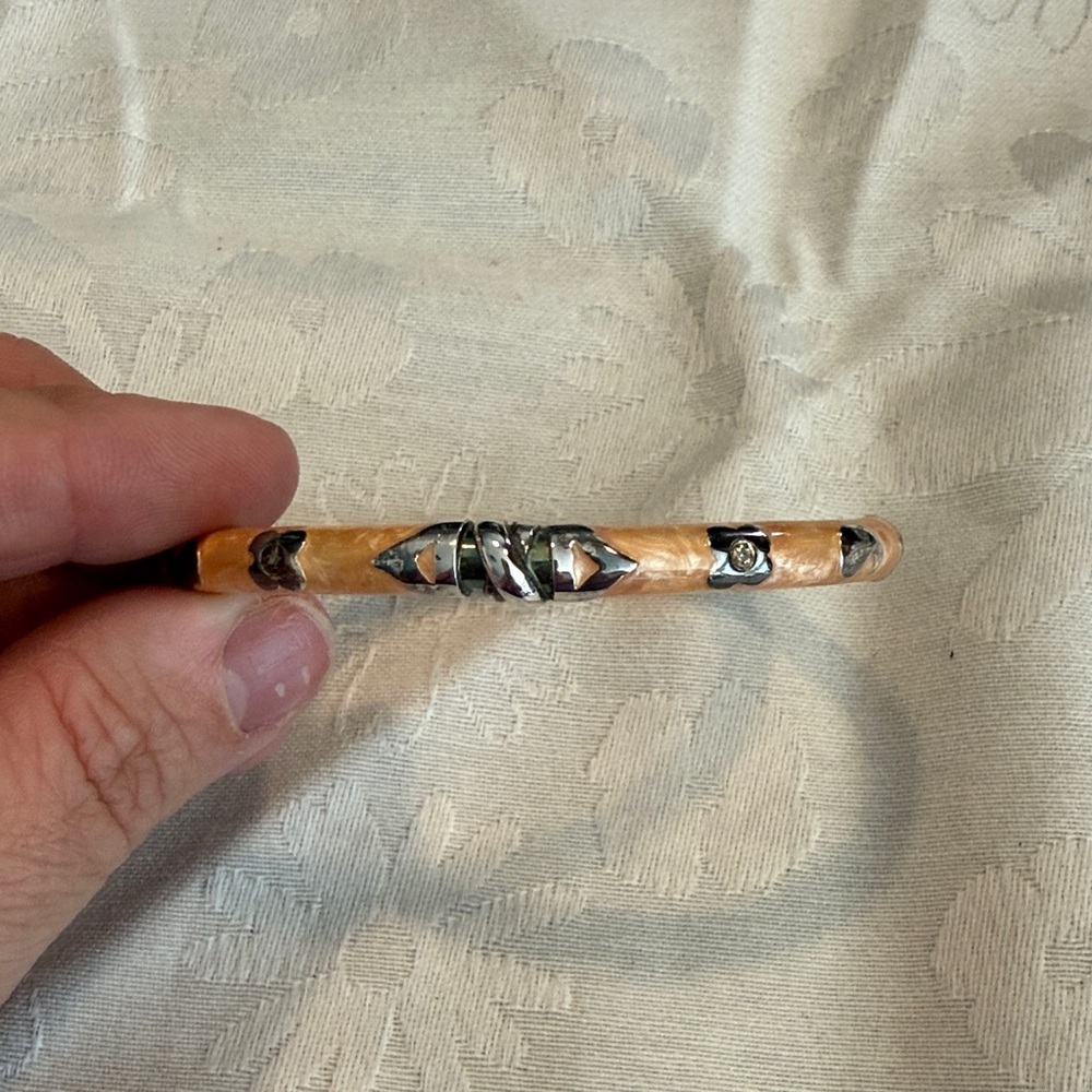 Carved Peach-Tone Bangle Bracelet with Silver Accents